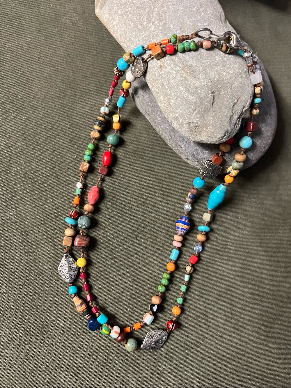Boho look of assorted gemstone silver accents , trade and paper beads 30” long